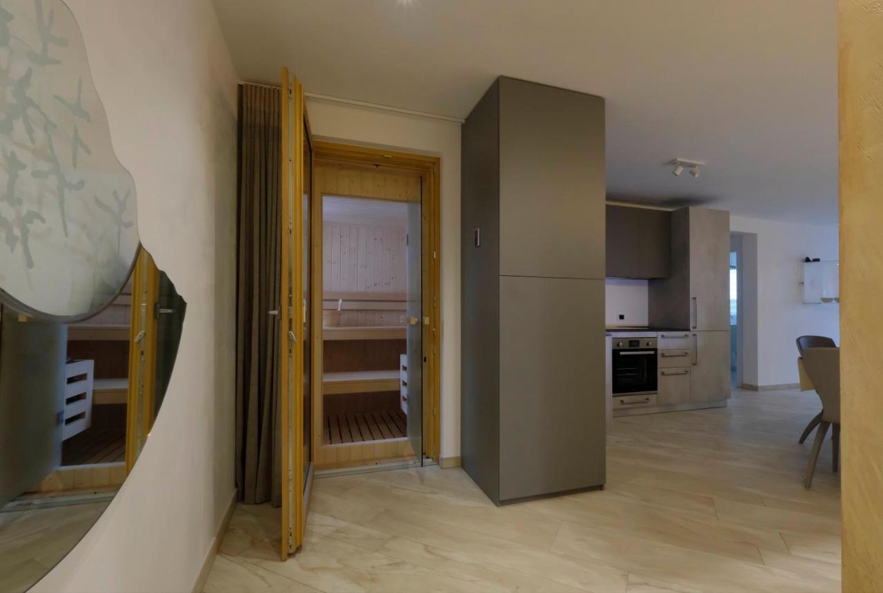 Wellness Fassa Apartment Pozza di Fassa Bagian luar foto
